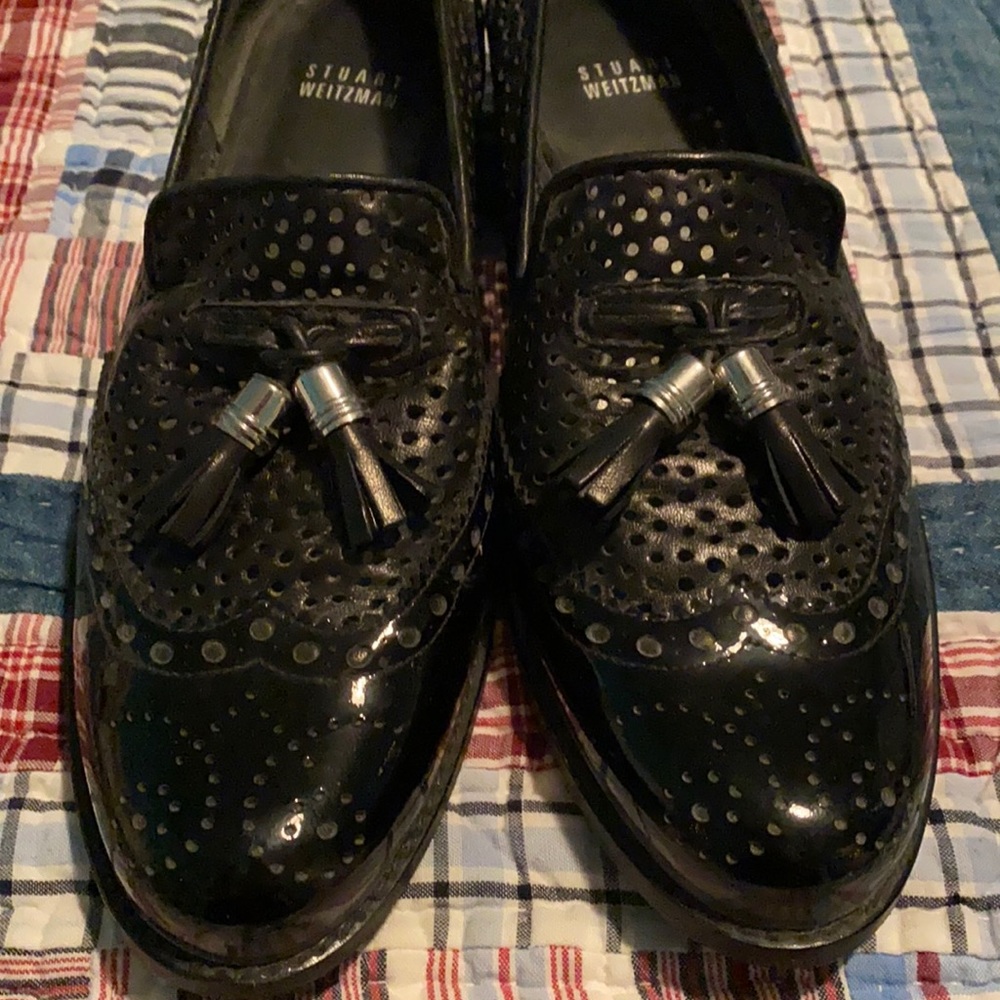 Stuart Weitzman black tasseled loafers